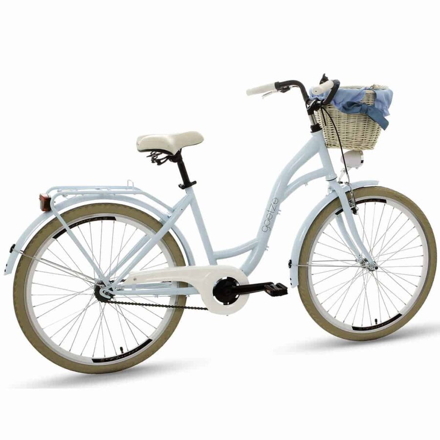 Bicicletă albastră cu coș și portbagaj alb.