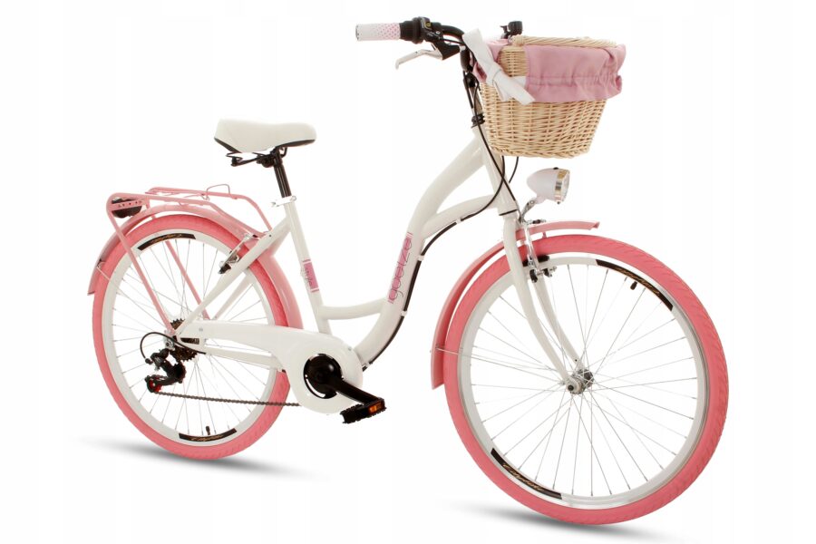 Bicicletă albă cu coș și anvelope roz.