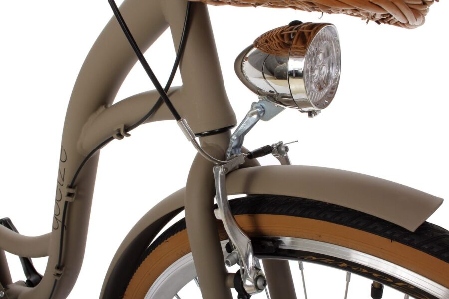 Far bicicletă modernă, cadru bej, coș ratan.
