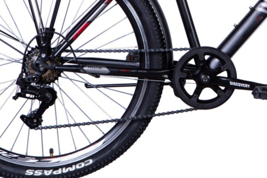 Detaliu dintr-o bicicletă cu transmisie visibilă