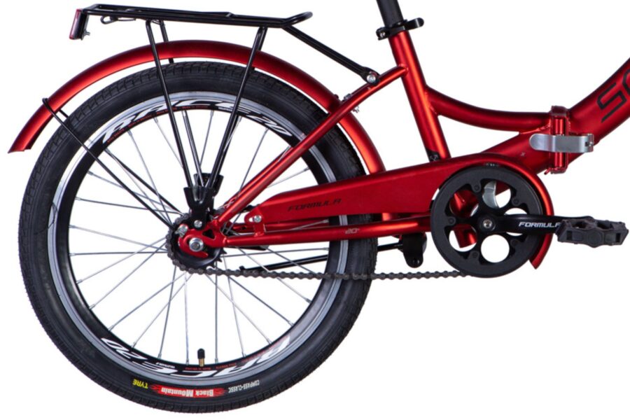 Bicicletă roșie cu roată spate și cadru metalic.