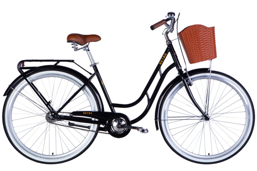 Bicicletă retro cu coș și cadru elegant.