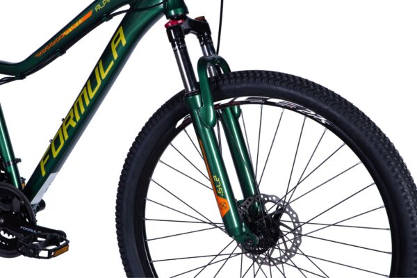 Bicicletă verde cu roată față și furcă